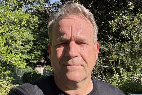 Person in garden on a sunny day.