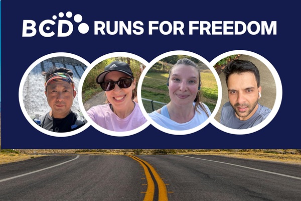 BCD Runs for Freedom event banner with runners.